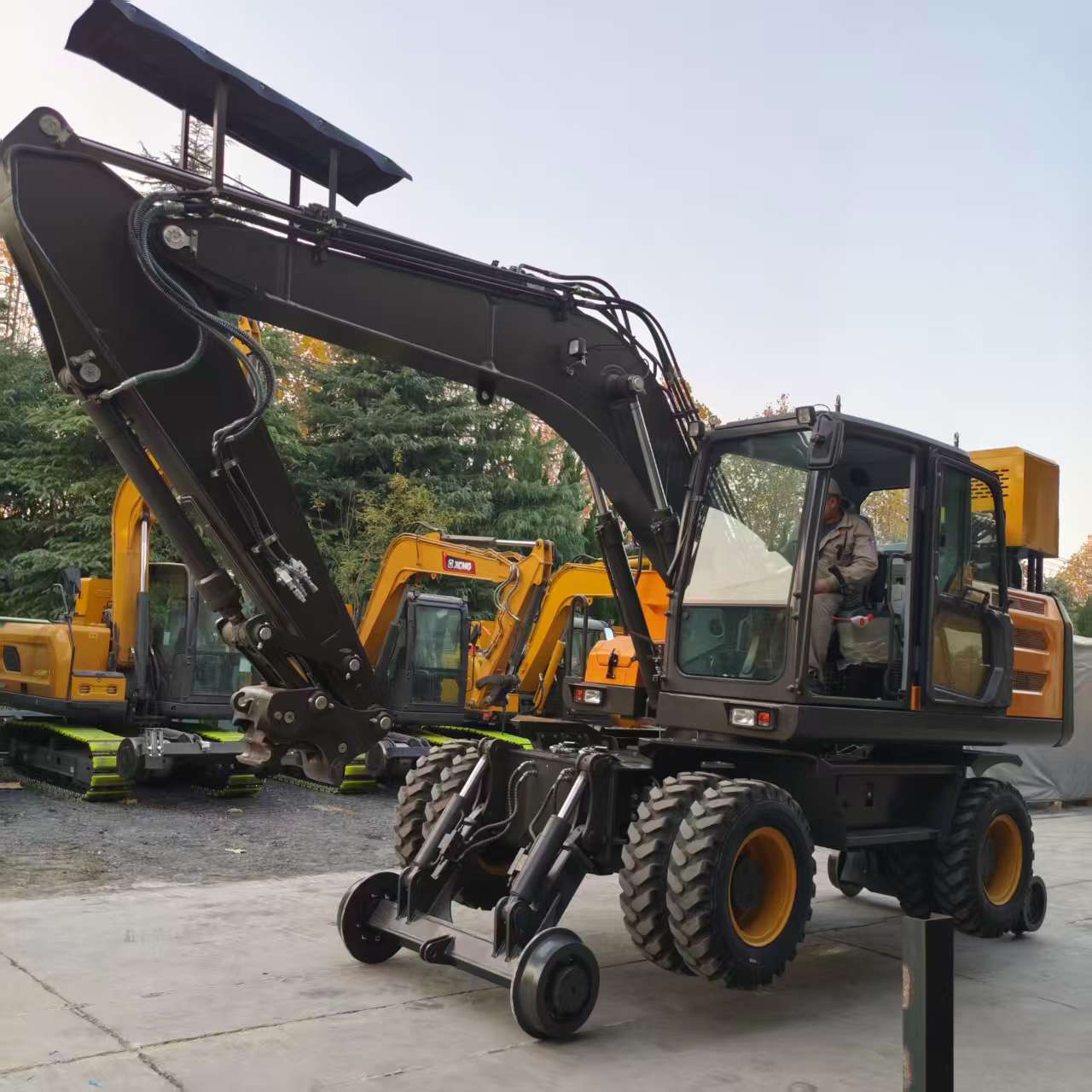 Rail excavator conversion and sleeper replacement factory